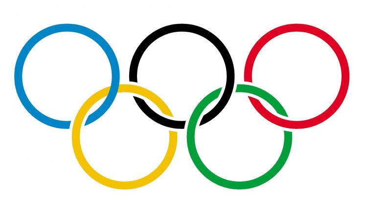 Fünf ineinander greifende Ringe in fünf Farben auf Weiß; das olympische Symbol, das bei Veranstaltungen wie den Südkorea-Spielen verwendet wird.